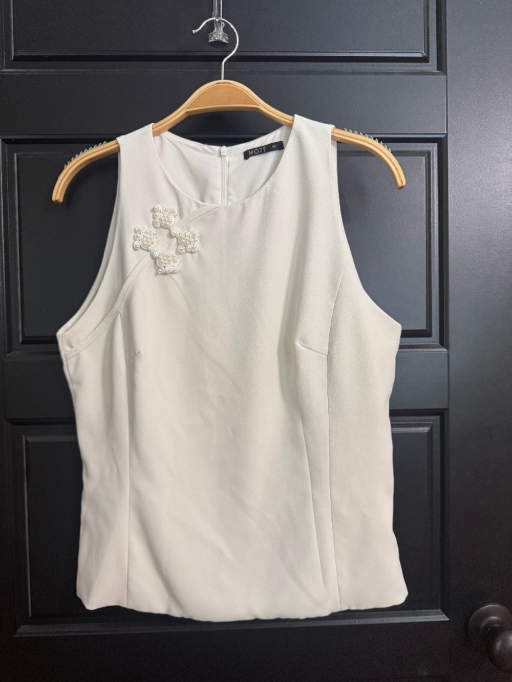 Sleeveless top with Button Detail